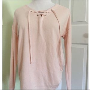 cross front pink sweater